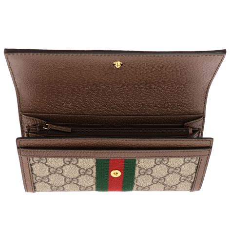 gucci las carteras som de cuero o cuero sintético